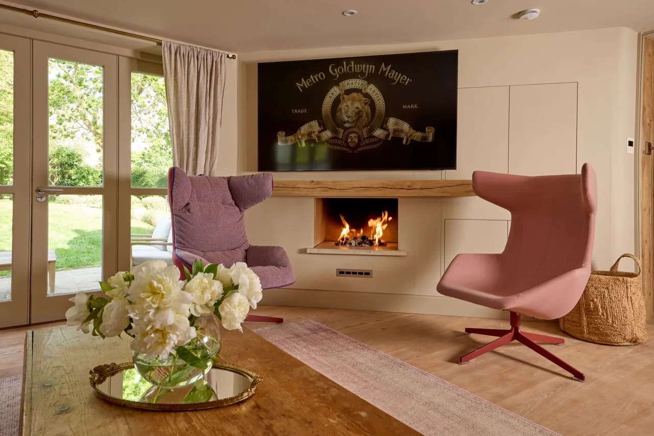 Private tennis court at a Cotswolds luxury estate